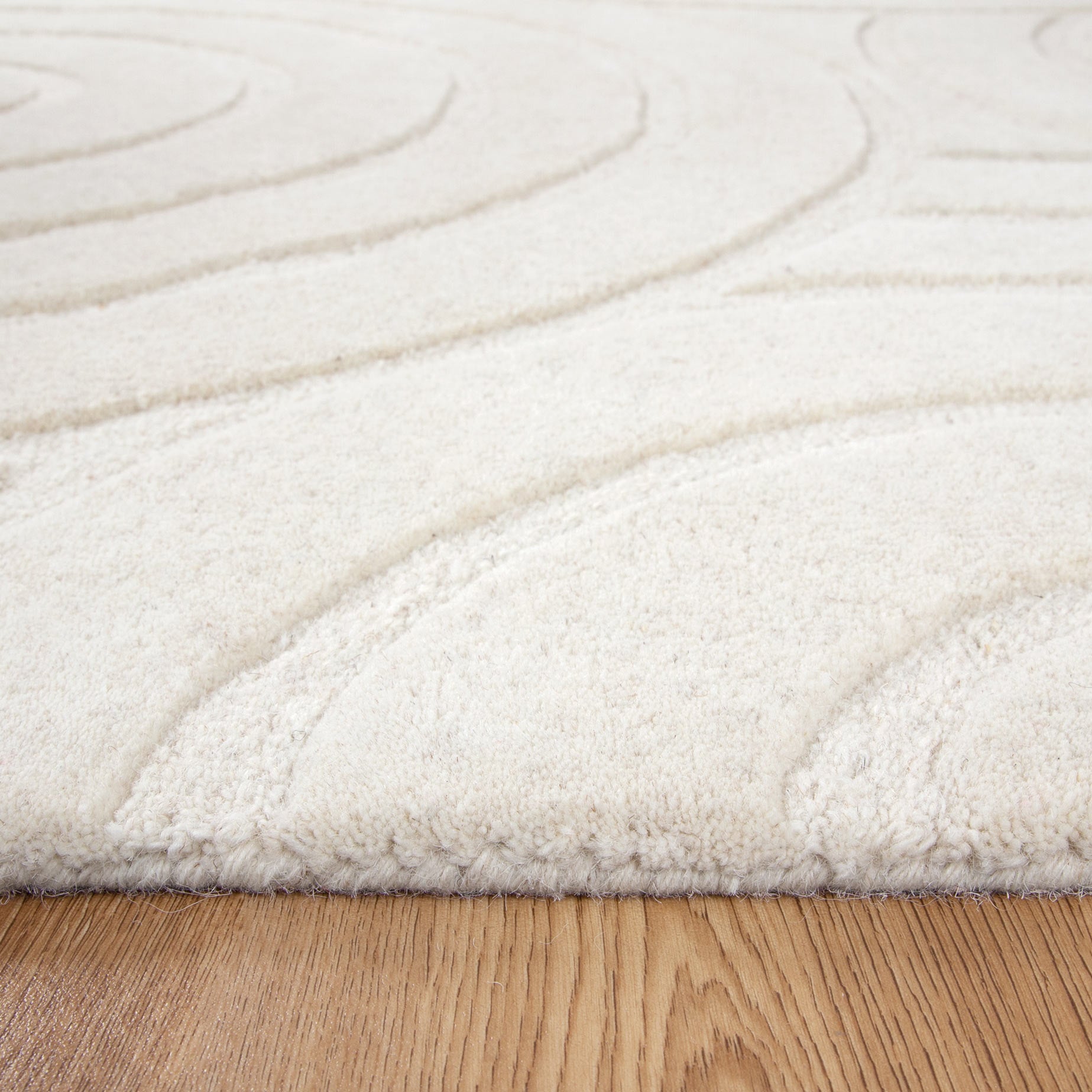 Plush wool pile of the Ellipse Cream Wool Rug | Simple Style Co