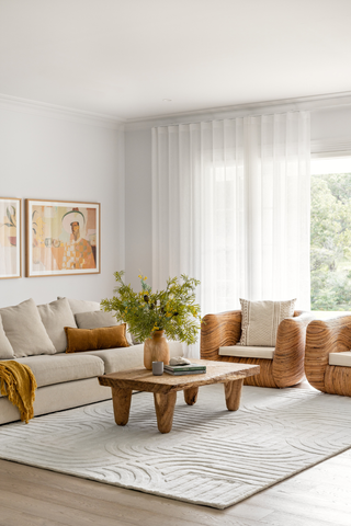 White rug styled in a bright Australian living room