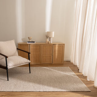 Beau Natural wool rug styled in modern neutral living room