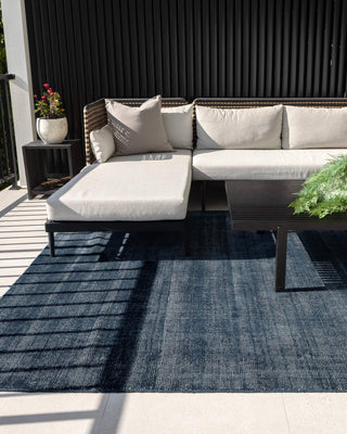 Harbour Steel Indoor Outdoor Rug styled with sectional sofa 