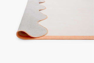 Bitonto Tonal Peach and Cream Scalloped Washable Rug