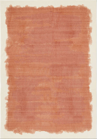 Textured red-brown area rug on a beige background