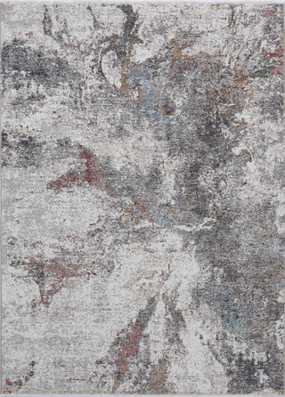 A vintage-inspired rug with a modern design, featuring a complex pattern of different colors including beige, brown, and red.