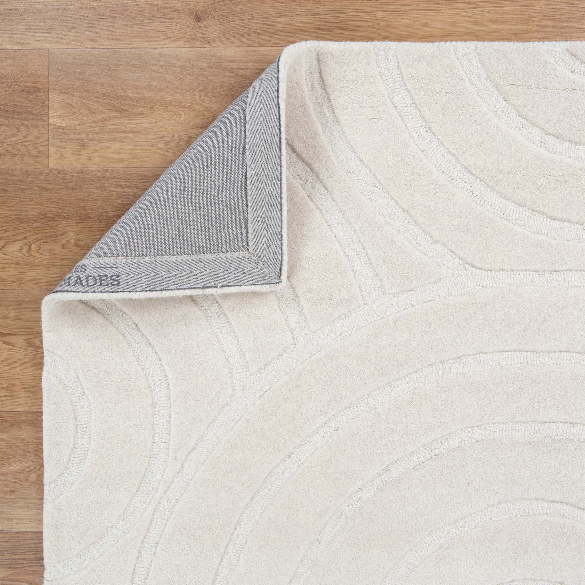 Detailed view of the Ellipse Cream Wool Rug | Simple Style Co