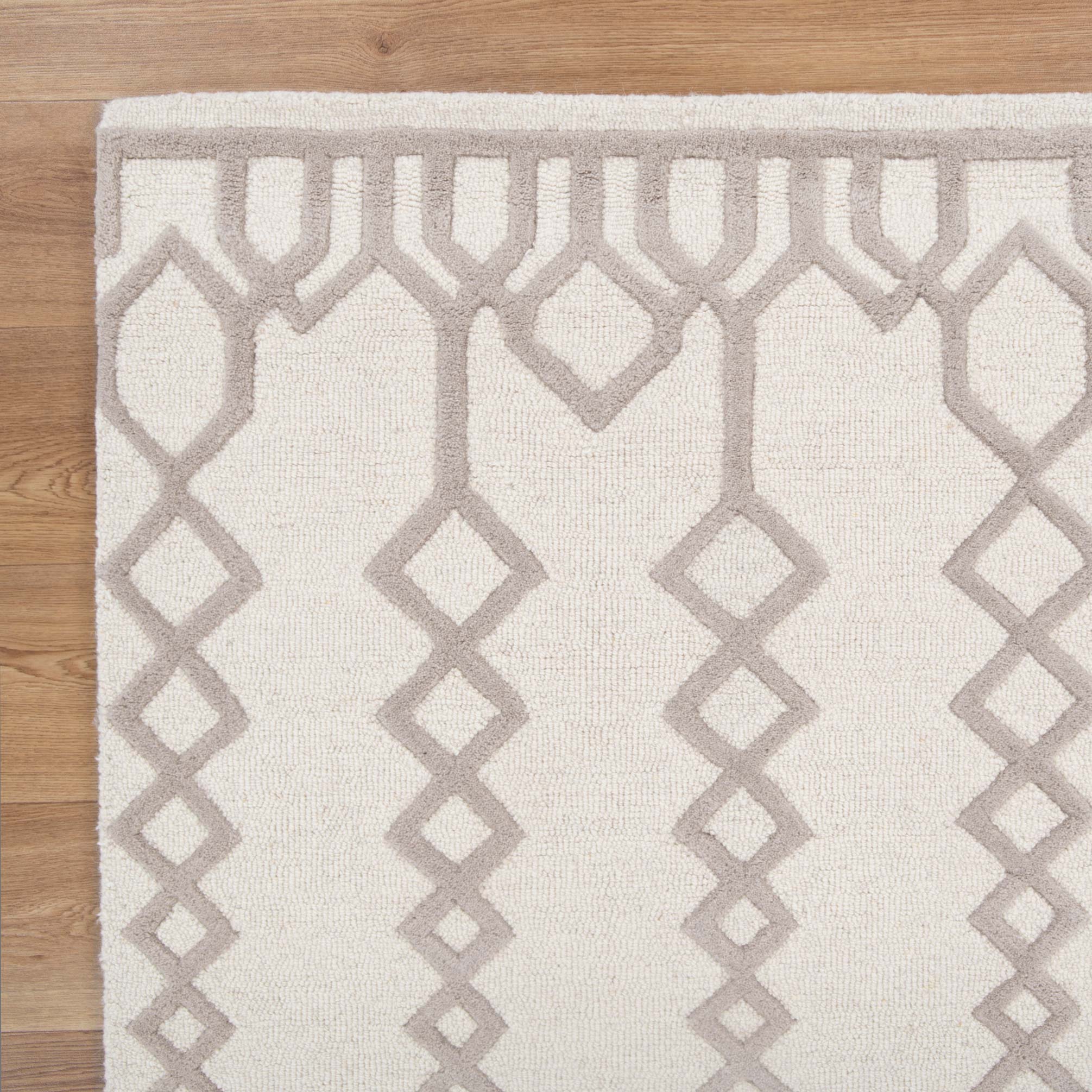 Close up view of the Senso Beige Wool Rug by Simple Style Co
